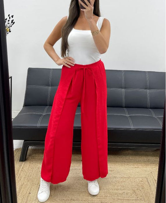 PANTALON A VOLANTS A NOUER